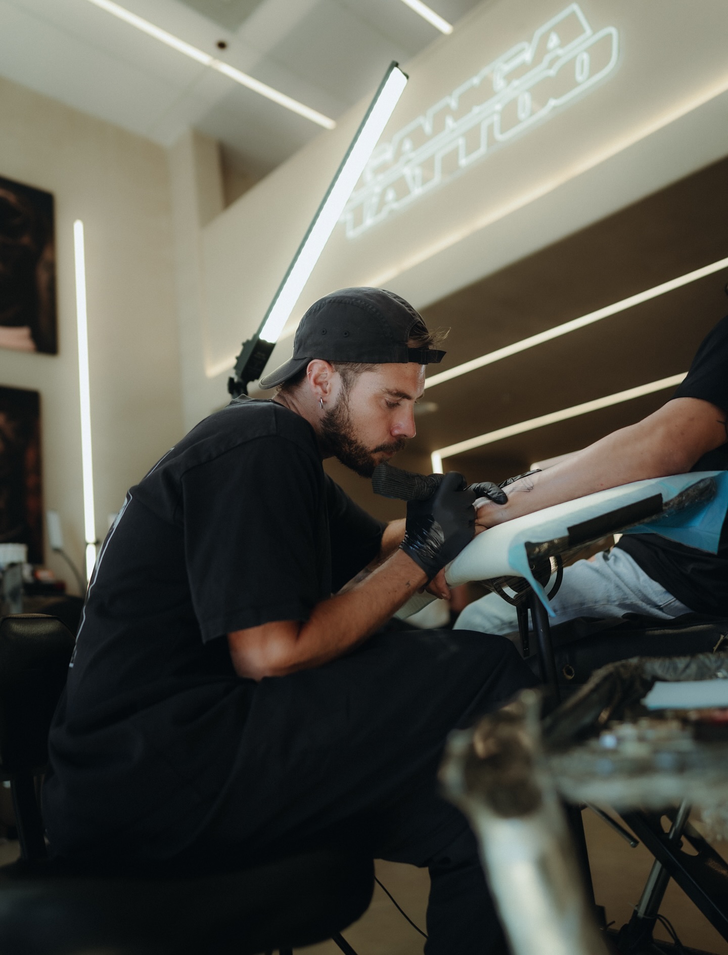 Fran D. Menchi tattooing at Ganga Tattoo